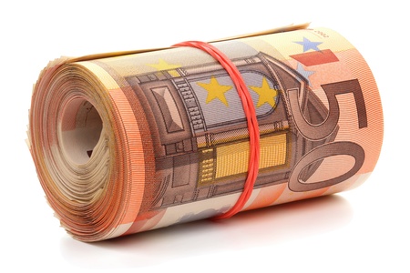 Roll of fifty euro banknotes with a rubber band, isolated on the white background, clipping path included. Full focus.の写真素材