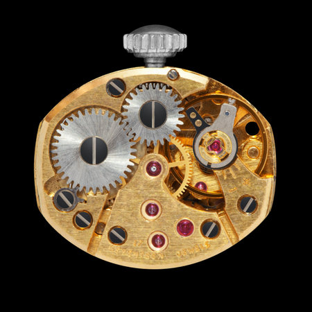 Closeup of clock works, isolated on the black  background, clipping path included.