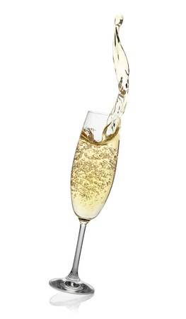 Flute with abstract splash of champagne, isolated on the white backgroundの写真素材