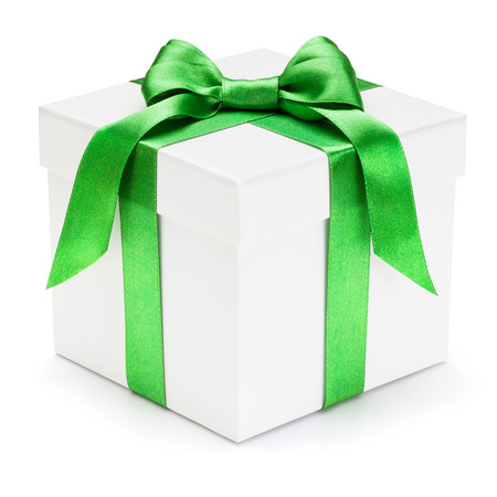 Gift box with green ribbon and bow, isolated on the white background, clipping path included の写真素材
