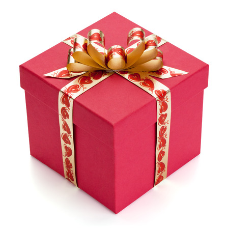 Red gift box with golden ribbon and bow, isolated on the white background, clipping path included の写真素材