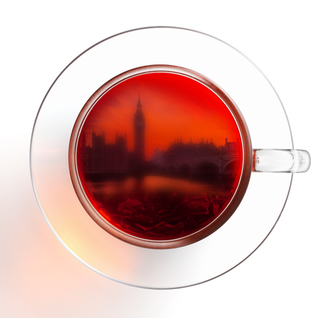 Glass cup of tea with the silhouette of London, isolated on the white background, clipping path included.の写真素材