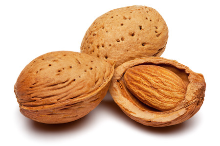 Closeup of almonds, isolated on the white background,の写真素材