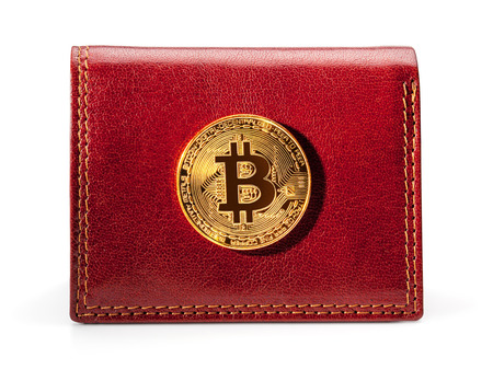 Leather wallet with golden bitcoin coin, isolated on the white background, clipping path included.の写真素材