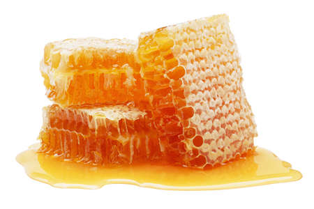 Closeup of honeycombs isolated on the white background, clipping path included.の写真素材