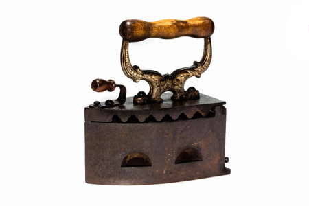 Antique Old irons isolated on white background.の写真素材