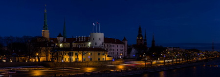 Riga Castle, 11 November Embankment, Old Town at night. - famous European city where tourists can find a unique atmosphere of Middle Agesの写真素材