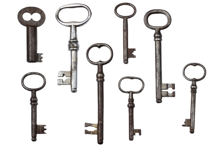 Old antique vintage key on white backgroundの写真素材