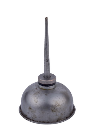 Old metal oil can, isolated on white backgroundの写真素材