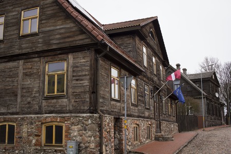 LIEPAJA, LATVIA - March, 2017: Wooden architecture. Liepaja is a great place to see old wooden residential buildings from the 17th, 18th and 19th centuries usually topped with a red tile roof.のeditorial素材