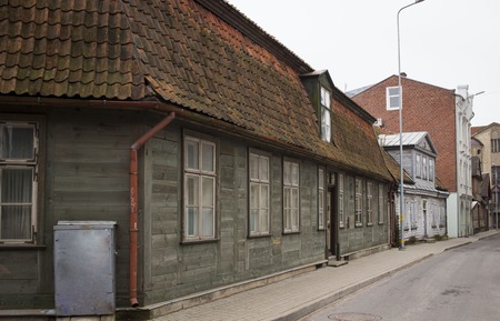 LIEPAJA, LATVIA - March, 2017: Wooden architecture. Liepaja is a great place to see old wooden residential buildings from the 17th, 18th and 19th centuries usually topped with a red tile roof.のeditorial素材