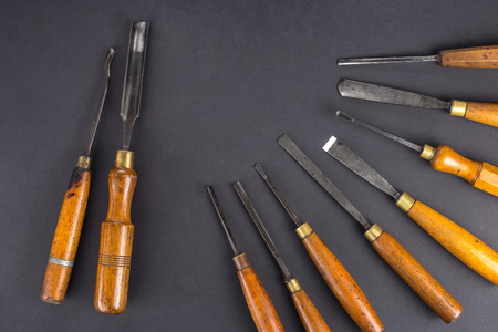 Set of wood chisel for carving wood, sculpture tools on grayの写真素材