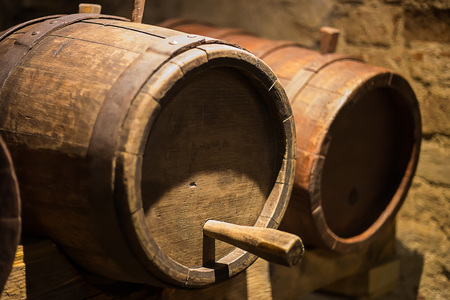 Wine barrels in the a wine cellarの写真素材
