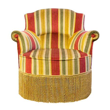 Vintage armchair with fringe of fifties design style with isolated on white bの写真素材