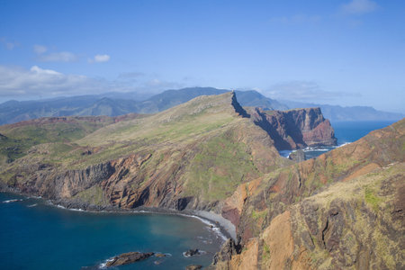 Spectacular vistas of the dramatic cliffs and azure waters of Ponta de Sao Lourenco on Madeira, showcasing the natural beauty of this coastal region under clear skies.の写真素材