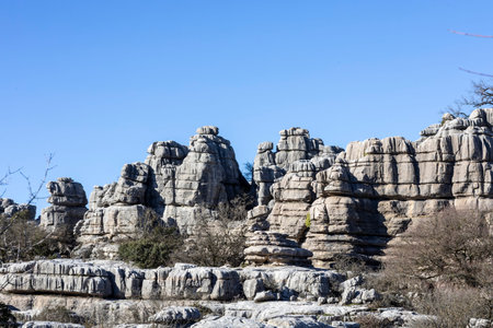 Visitors enjoy the stunning rock formations at El Torcal in Spain. This location offers a chance to...