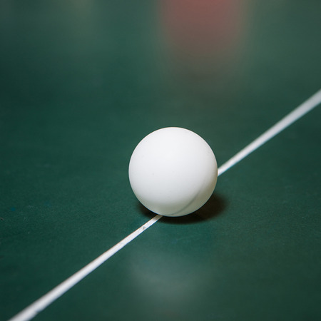 Two table tennis rackets and ballsの写真素材