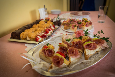 sandwiches and sweet on the table の写真素材