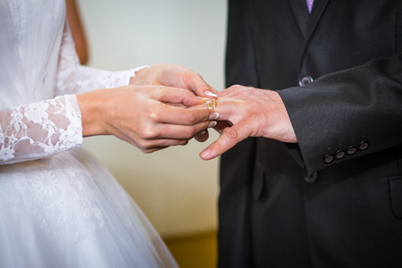 exchange of rings at wedding の写真素材