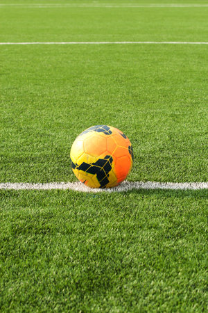 soccer ball on artificial grass fieldの写真素材