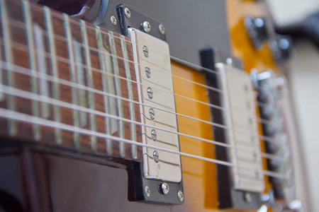 Electric guitar body, strings and buttons