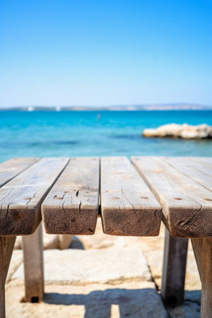Wooden table and chair on the beach in Kefalonia, Greeceの素材