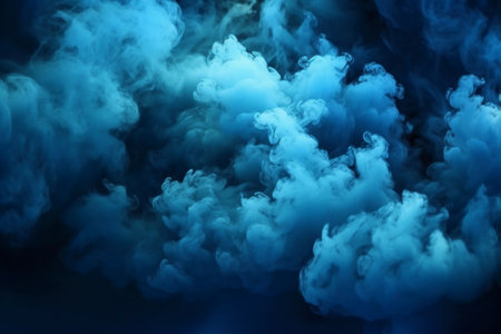 Clouds of blue smoke on a dark background. Design element.の素材
