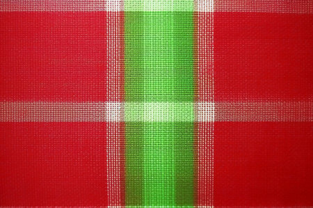 Red and green checkered tablecloth, closeup of photoの素材