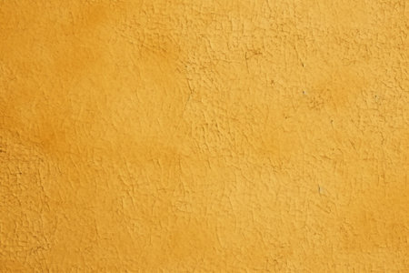 Texture of old rustic wall covered with yellow stucco. Abstract background for design.の素材
