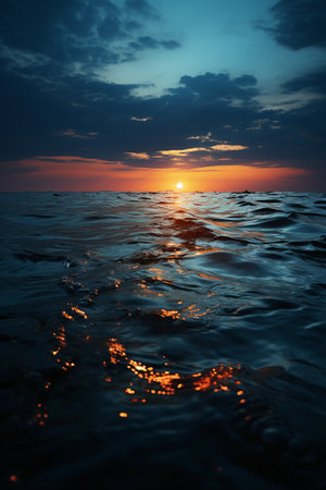 Beautiful sunset over the sea. Sunset over the sea. The sun is reflected in the water.の素材