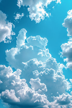 Blue sky background with white clouds. Cumulus clouds in the blue sky.の素材