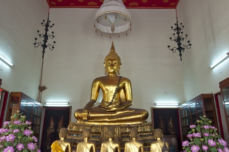 Golden Buddha Image and followers,satellite at Wat Pho,Stutue of buddha, Bangkok,Thailandの写真素材