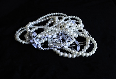 Beads from pearls on a black backgroundの写真素材