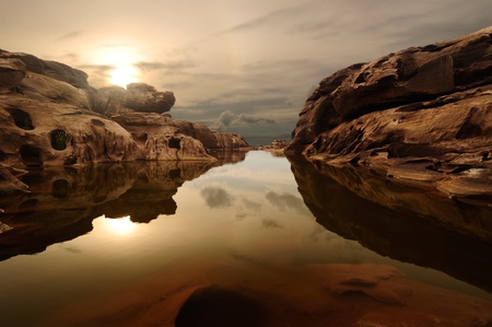 sunrise head dog at Sam Phan Bhok Grand Canyon, Mekhong river, Ubon Ratchathani, Thailand sunrise head dog at Sam Phan Bhok Grand Canyon, Mekhong river, Ubon Ratchathani, Thailand