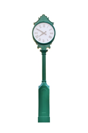 An old exterior clock on whiteの写真素材