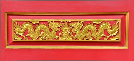 Gold dragon on the wallの写真素材