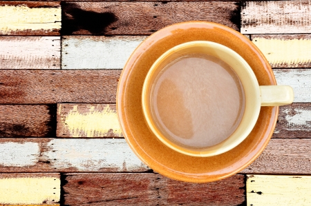 Coffee cup on vintage wood backgroundの写真素材