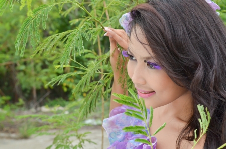 Beautiful woman looking into the distanceの写真素材