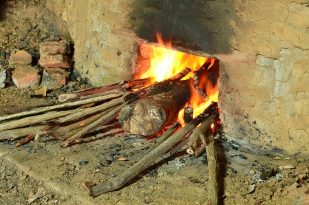 Burning wood to make Charcoalの写真素材