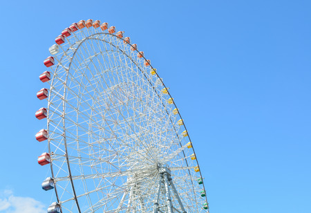 Ferris wheel over blue skyの写真素材