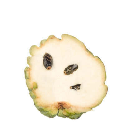 Sliced custard apple isolated on white backgroundの写真素材