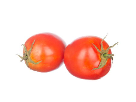 Tomatoes isolated on white backgroundの写真素材