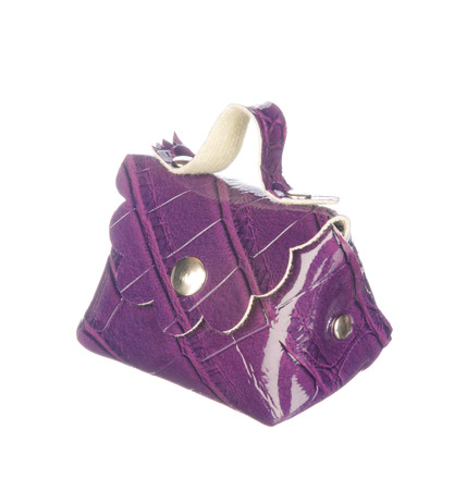 Purple crocodile leather bag isolated on white backgroundの写真素材