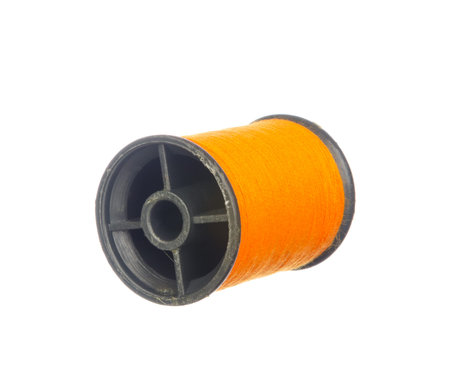 Colourful orange thread isolated on white backgroundの写真素材