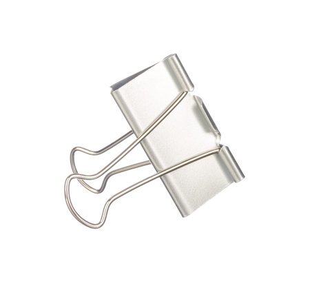 Silver paper clip isolated on white backgroundの写真素材