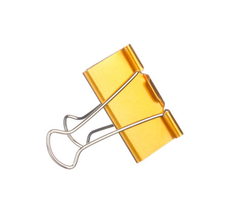 Yellow paper clip isolated on white backgroundの写真素材