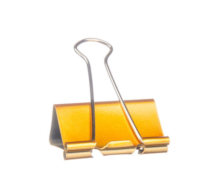 Yellow paper clip isolated on white backgroundの写真素材