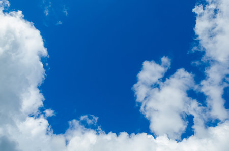 Blue sky with cloudsの写真素材