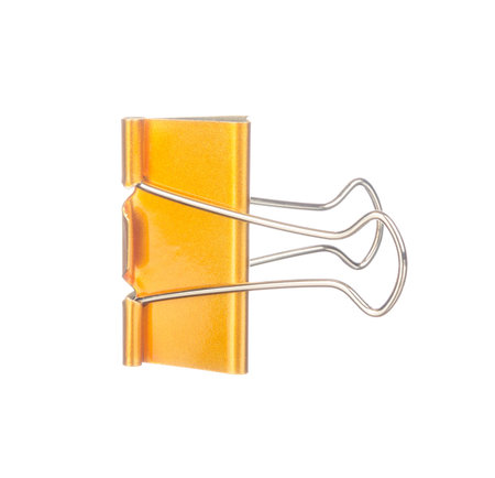 Yellow paper clip isolated on white backgroundの写真素材