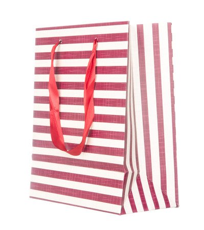 Empty fashion paper bag isolated on white backgroundの写真素材
